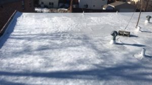 flat roof with snow