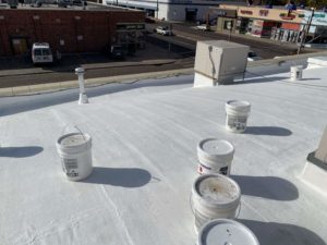 flat roof with buckets